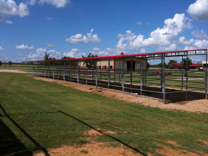 CHRIS COX'S 18 STALL OPEN AIR BARN MANUFACTURED BY LONESTAR BARNS